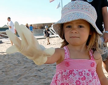 Toddler at a beach cleanup